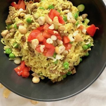 leftover lamb pilaf on black plate