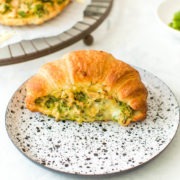 easy tuna melt savoury croissants on black and white plate with broccoli