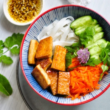 plant based tofu salad with rice noodles in a bowl