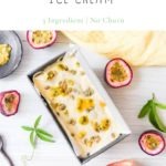 no churn passionfruit ice cream recipe in tin with passionfruits and passionfruit leaves around the edge