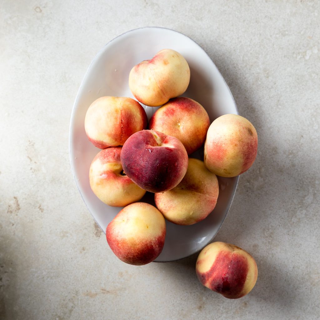 Fresh peaches on a plate