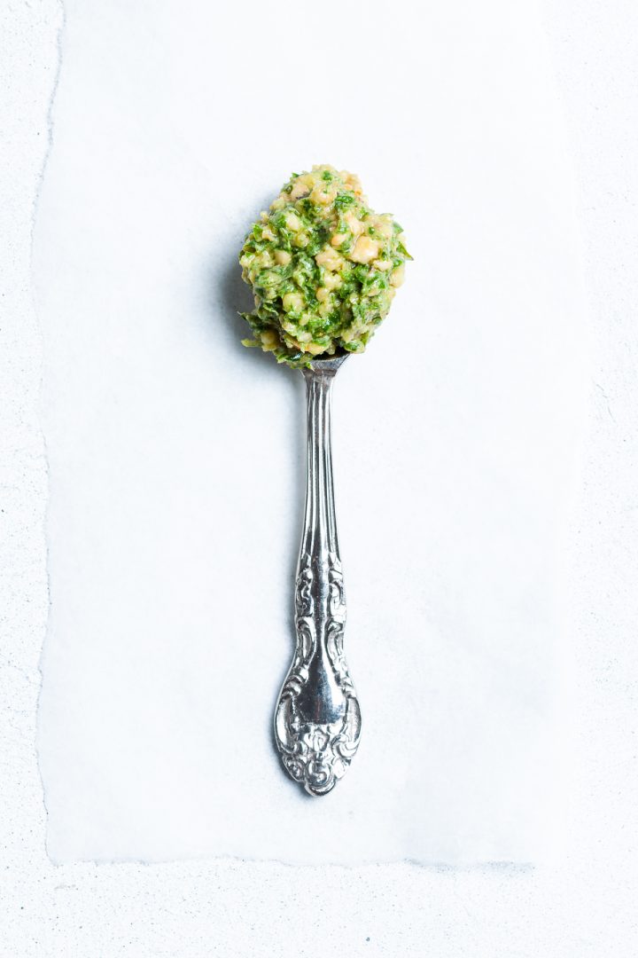 Close up of Thai pesto on a spoon, ready to use