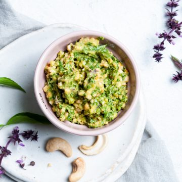 Thai basil in a pot with cashews