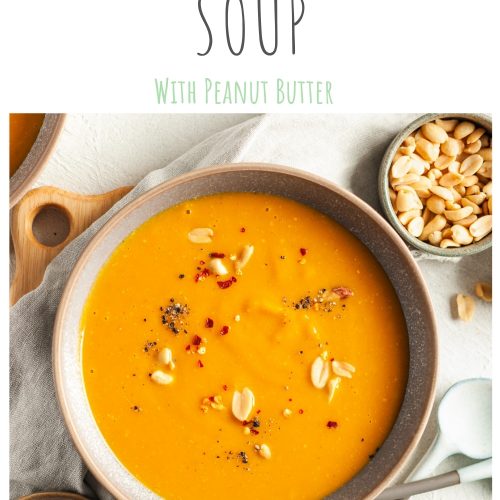 pin for vegan pumpkin soup with peanut butter showing an overhead shot of the soup in a bowl ready to eat, sprinkled with peanuts and chilli flakes