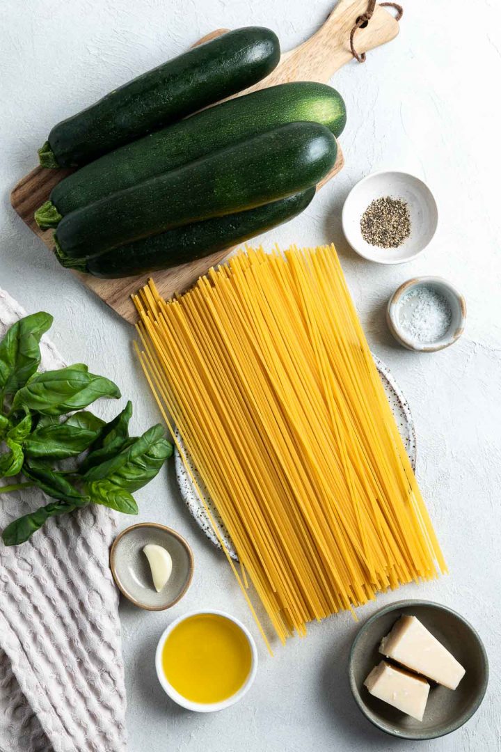 ingredients for spaghetti alla nerano weighed out and arranged in individual bowls and on plates