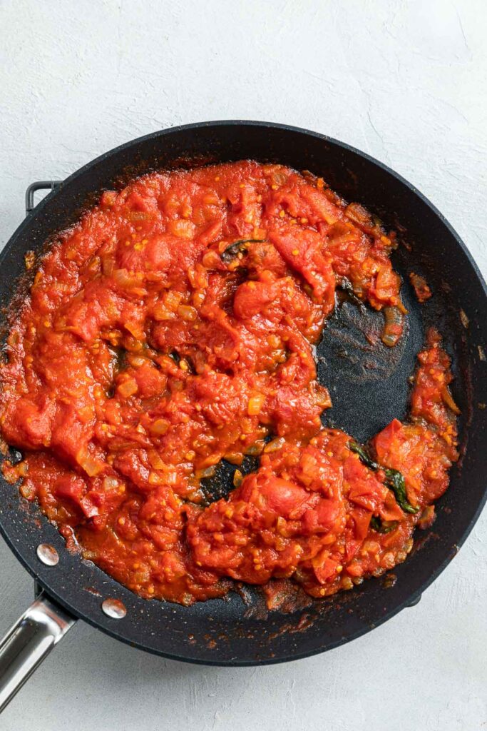 The tomato sauce once cooked down in the frying pan.