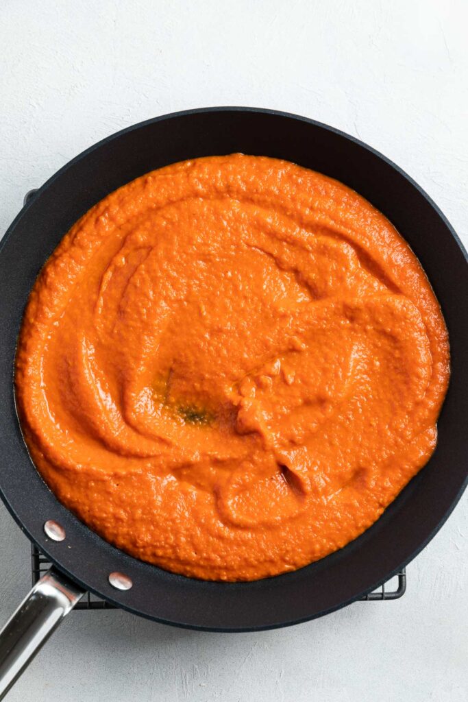 The blended tomato sauce in the frying pan.