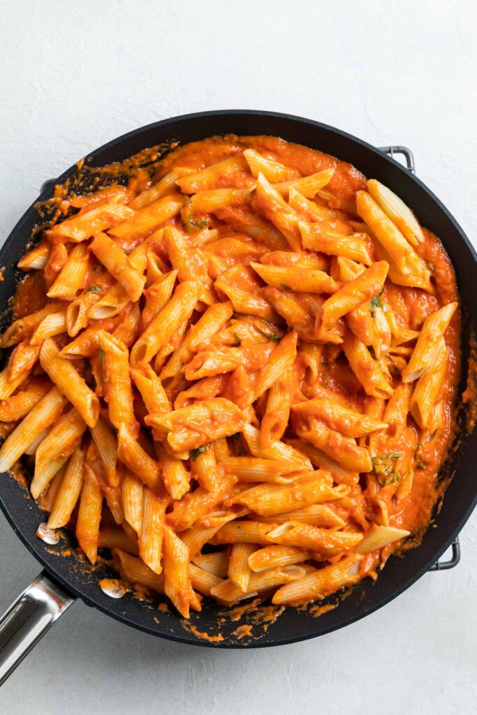 The sauce mixed with cooked pasta.