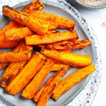close up of carrot fries on a plate