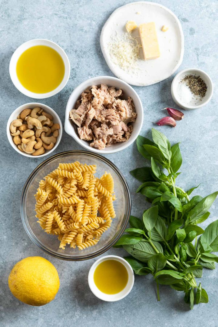 ingredients weighed and measured out in to individual bowls on a blue background