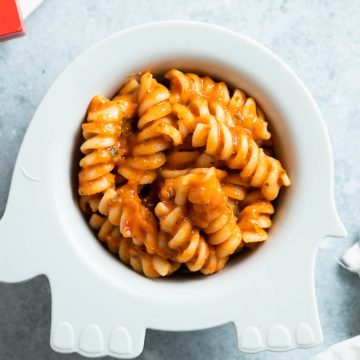 bowl of pasta mixed with baby pasta sauce