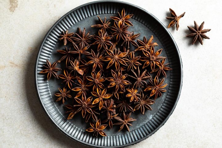 star anise pods on a metal plate