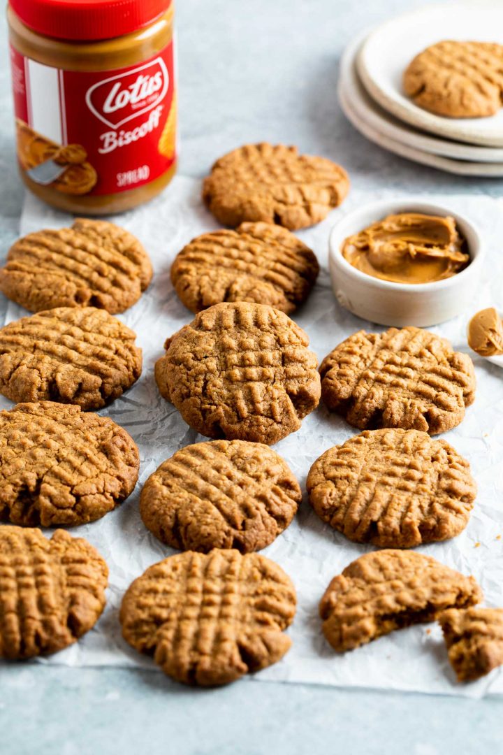 cookies with a jar of Lotus Biscoff spread in the background