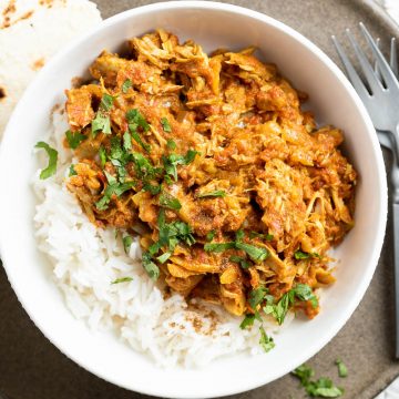 A bowl of chicken curry and rice ready to eat