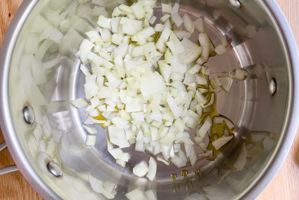 chopped onions in a saucepan with oil