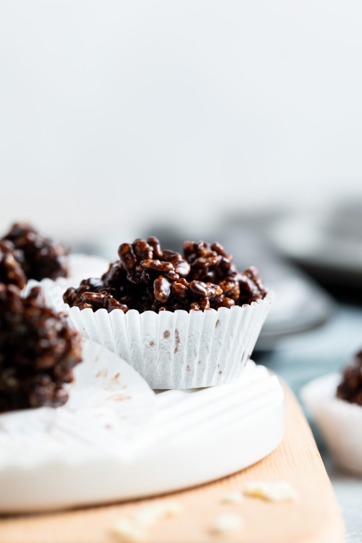 side view of white cupcake with chocolate crispies