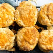 overhead photo of six cheese scones to show their melted cheese tops.
