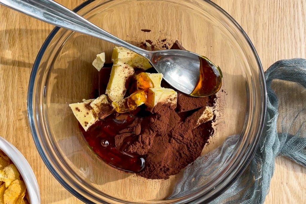 chocolate, butter, cocoa powder and golden syrup in a heatproof bowl.
