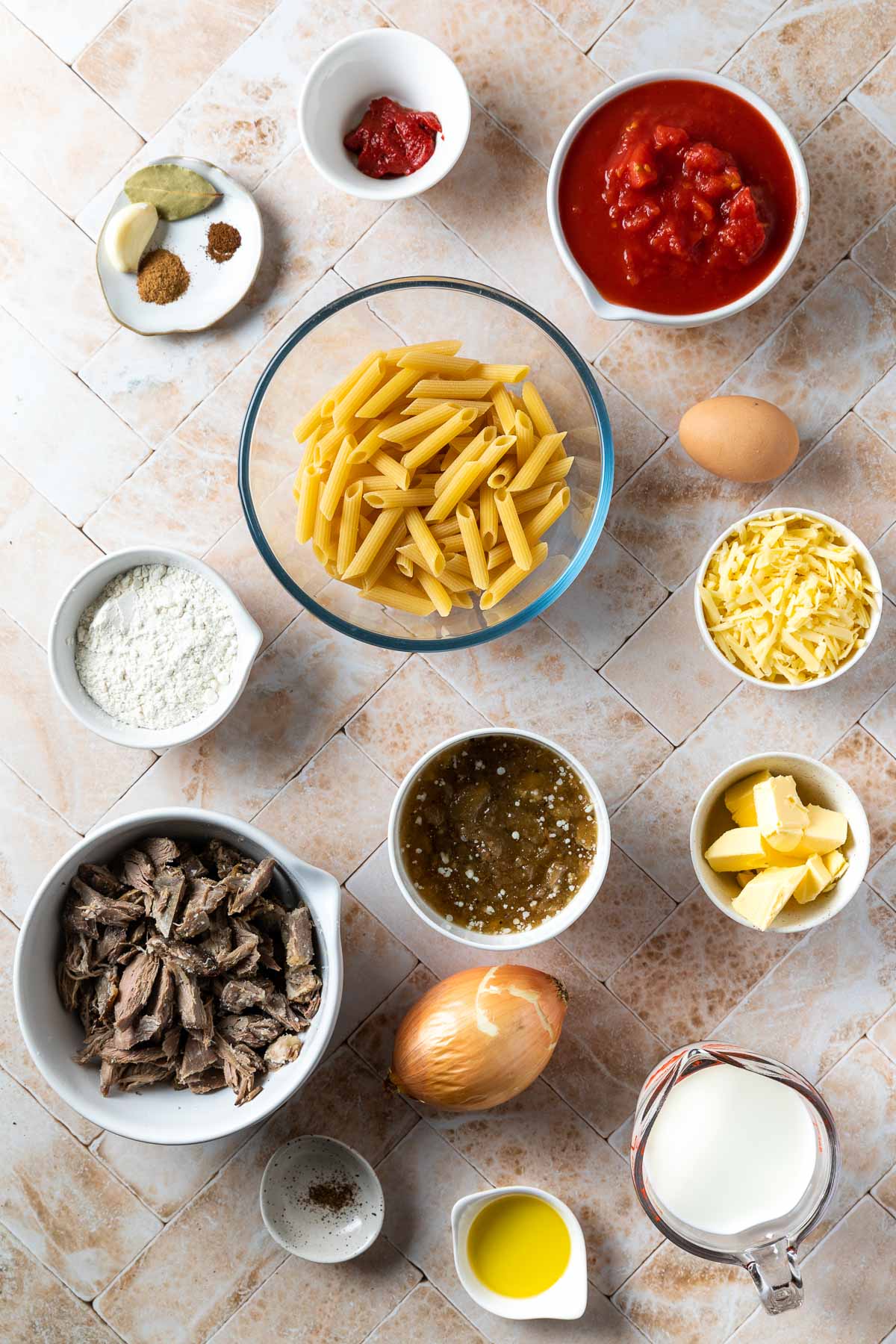 ingredients needed to make the lamb pasta bake weighed out and placed in individual bowls.