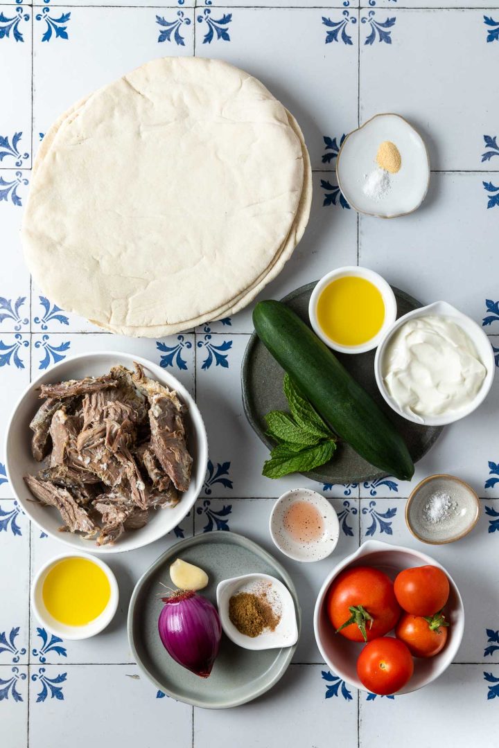 ingredients needed to make wraps with leftover lamb measured out and placed in individual bowls.