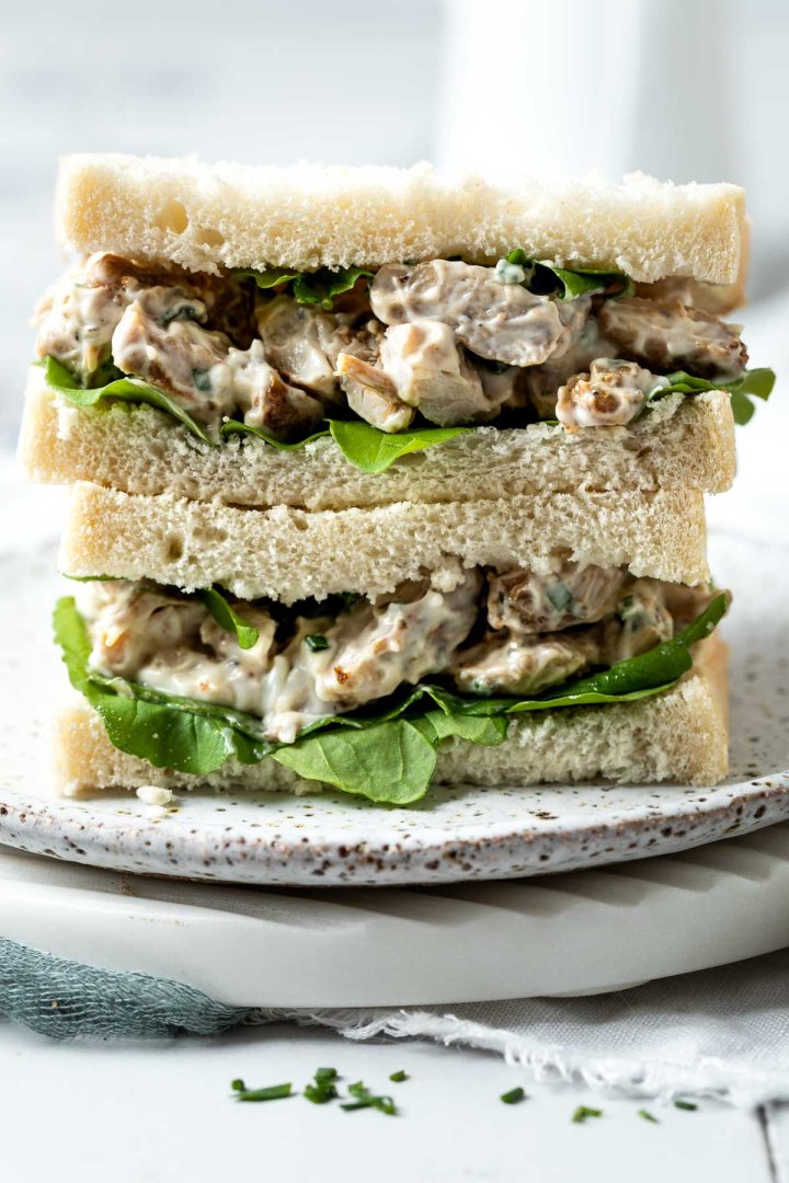 close up of stacked chicken mayonnaise sandwich.