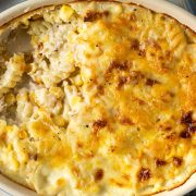 tuna pasta bake in oval baking dish with a portion taken out.