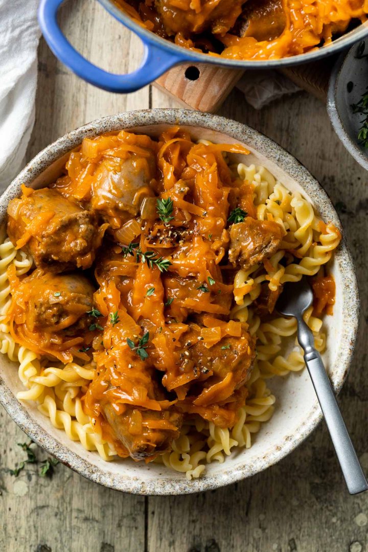 Devilled sausages served with pasta.