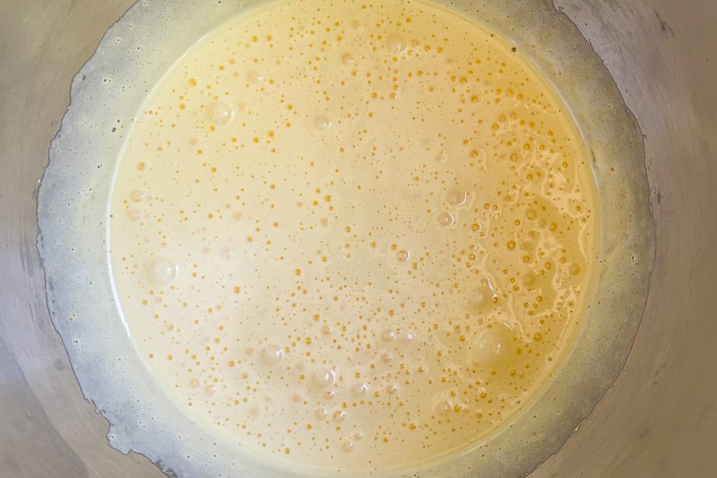 Eggs and sugar whisked together until light in the bowl of a stand mixer.