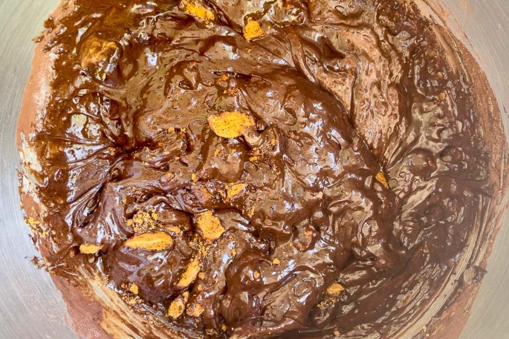 Biscoff cookies and chocolate chunks added to the brownie batter.