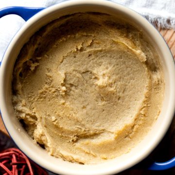 Brandy butter in a blue serving dish.