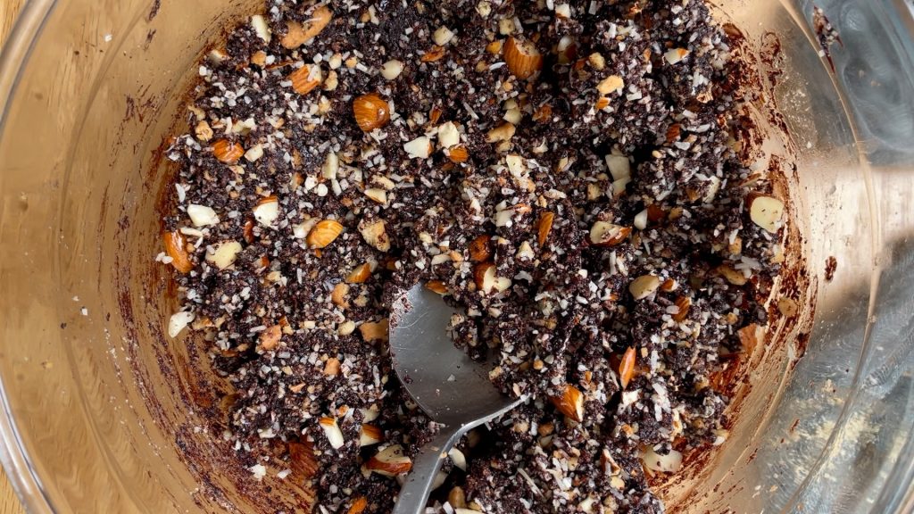 Coconut, biscuits and chopped almonds added to the chocolate.