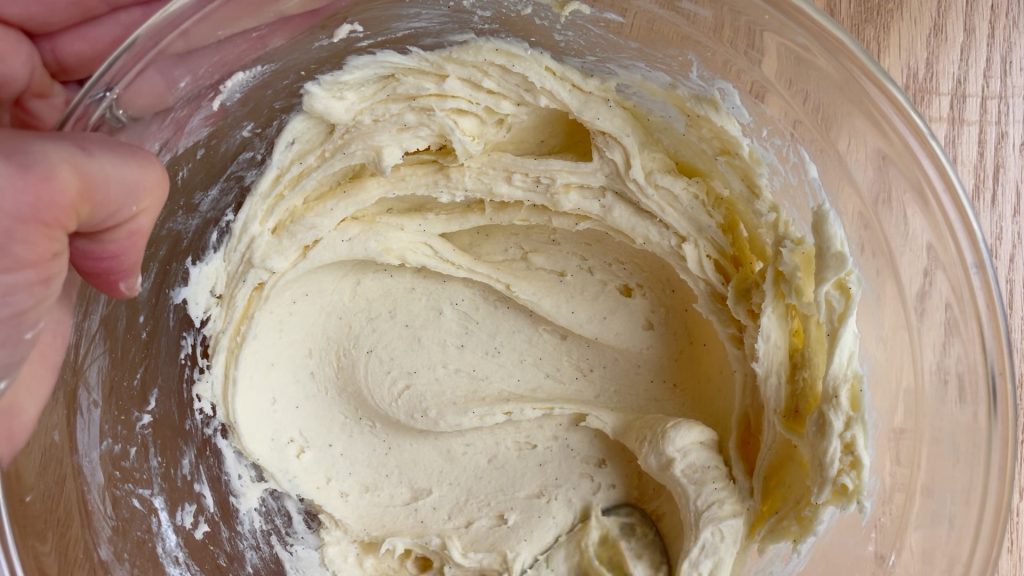The vanilla buttercream ingredients mixed together in a bowl