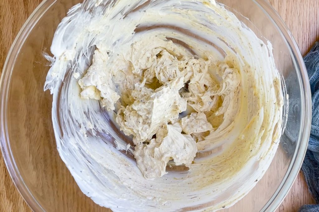 the cream cheese mixed with yogurt, curry powder and seasoning.