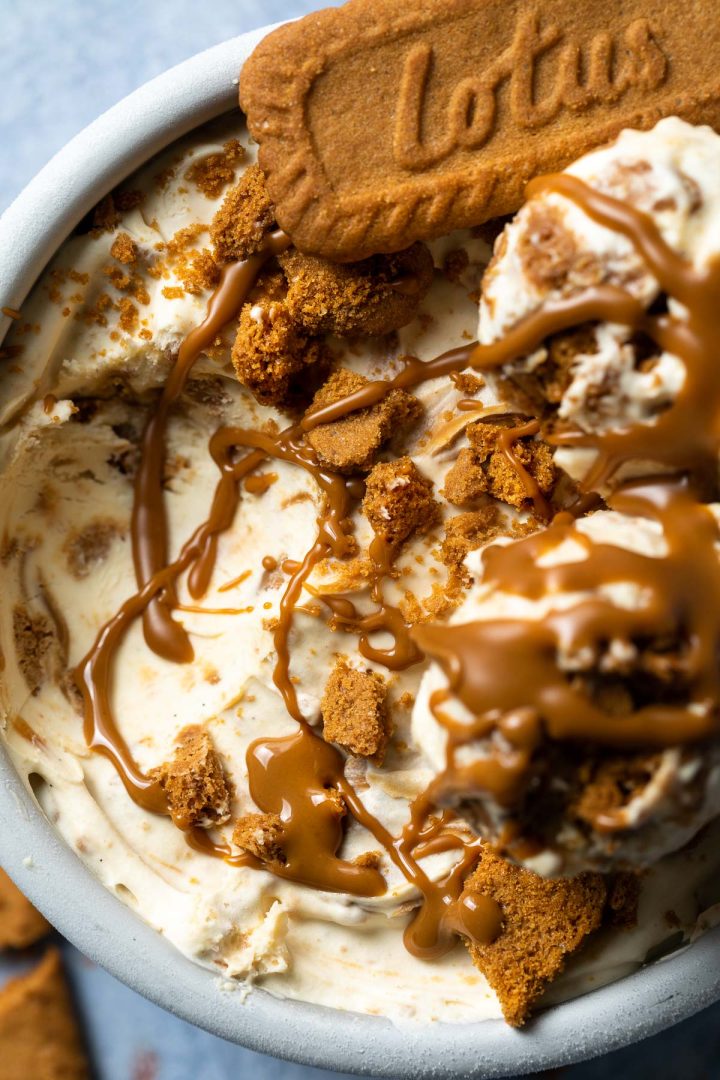 Close up of the tub of Biscoff ice cream with a couple of scoops taken out.