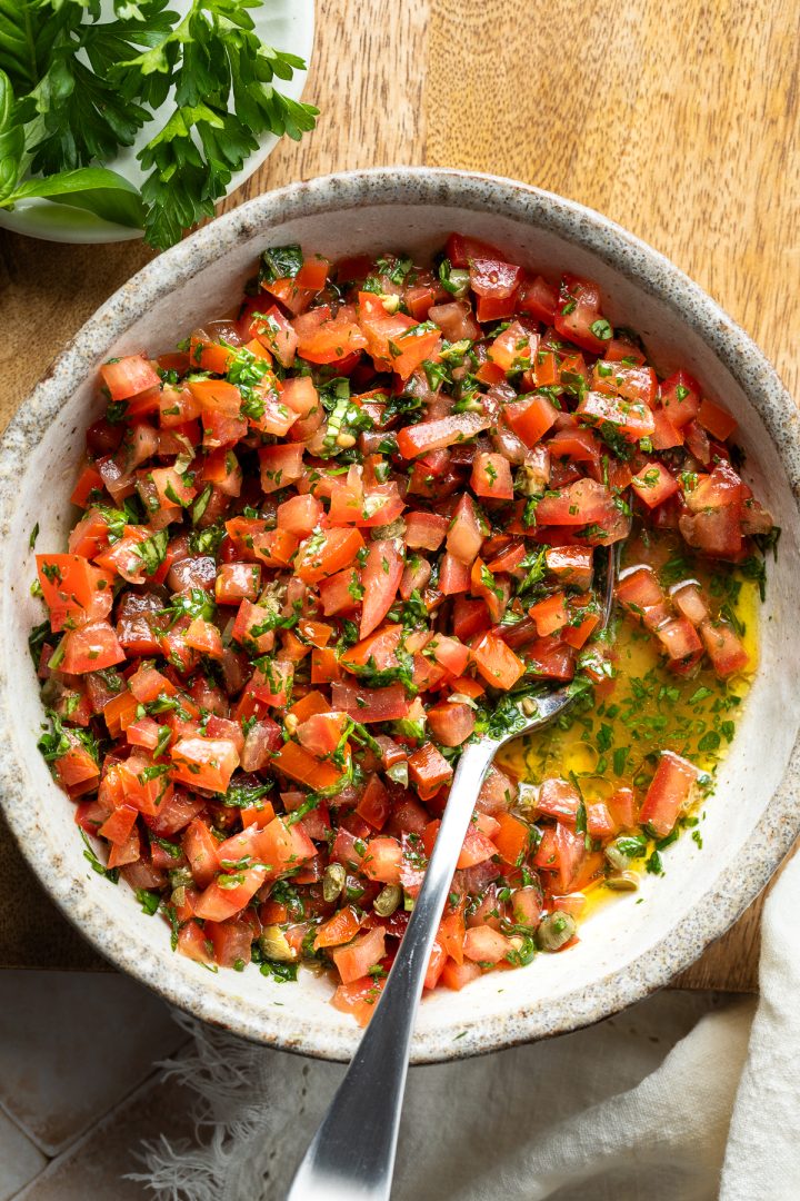 Close up of the prepared tomato vinaigrette.