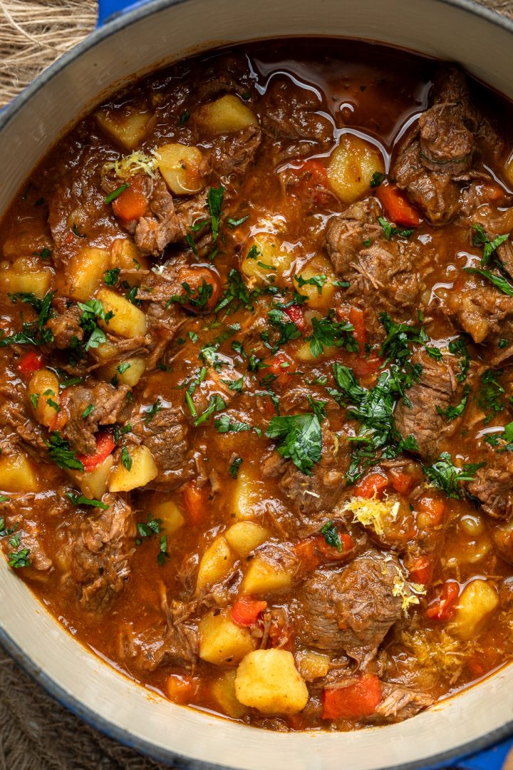 Close up of the cooked goulasch topped with fresh parsley.