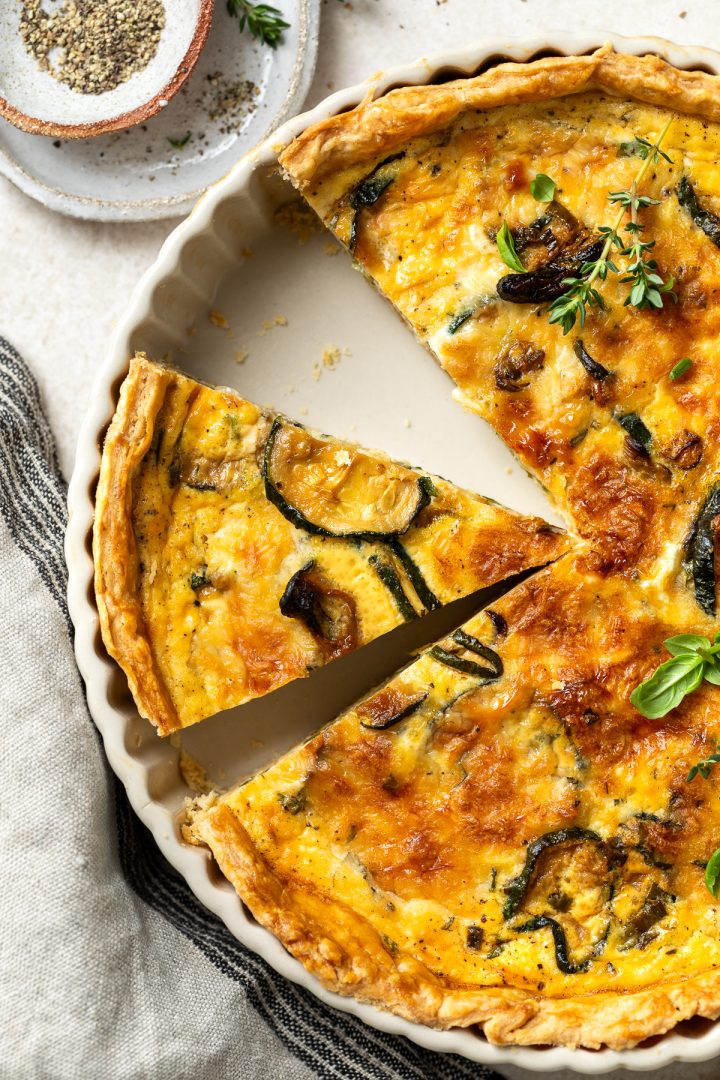Close up of the cooked courgette quiche in the dish.