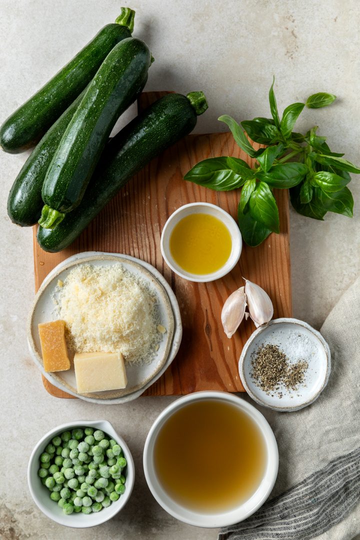 Ingredients needed to make the soup recipe placed in individual bowls.