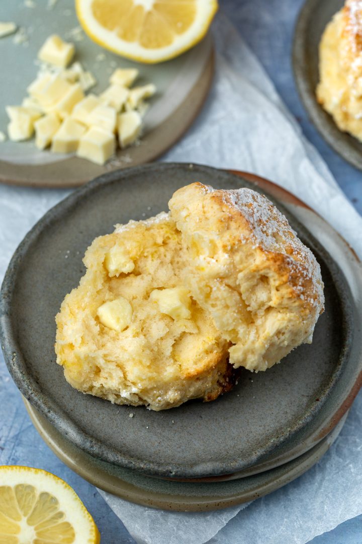 A fresh scone split open to show the chocolate chunks.