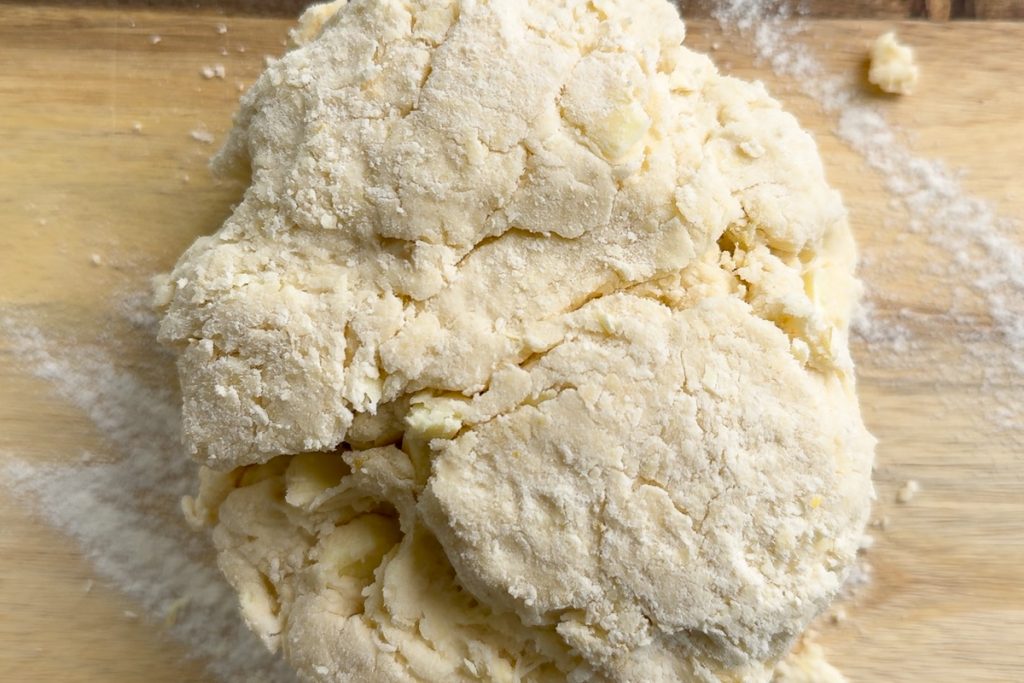 The finished lemon scone dough on a floured board.
