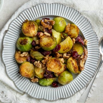 Plate of pan fried Brussels sprouts.