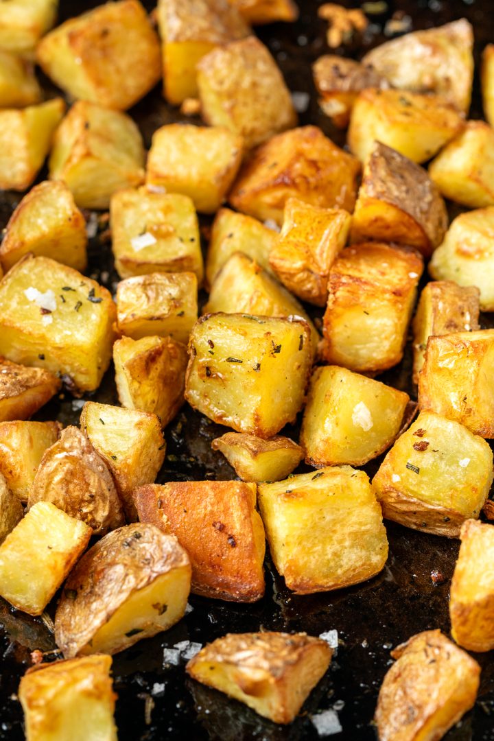 Close up of the toasted potato cubes on a tray.