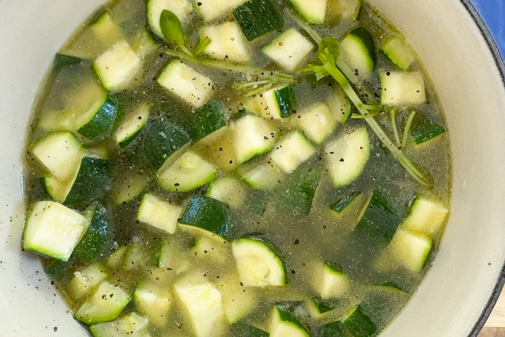 The cooked courgettes and stock.