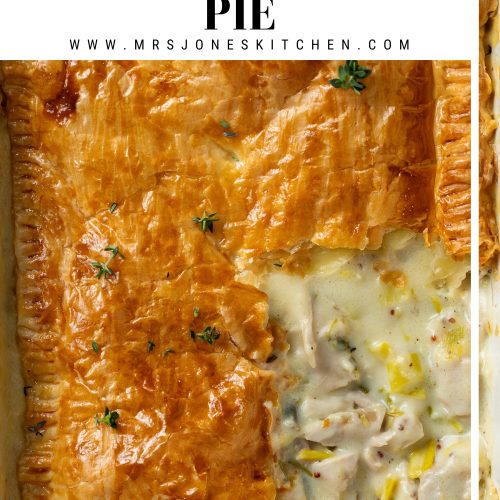 Close up of the chicken and leek pie with a portion of puff pastry taken off to show the creamy filling, with a text overlay to create a pin for Pinterest.