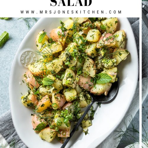 A plate of mayo-free herby potato salad with text overlay to create a pin for Pinterest.