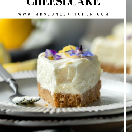 A slice of lemon cheesecake on a plate with text overlay to create a pin for Pinterest.