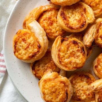 Puff pastry pinwheels on a plate.