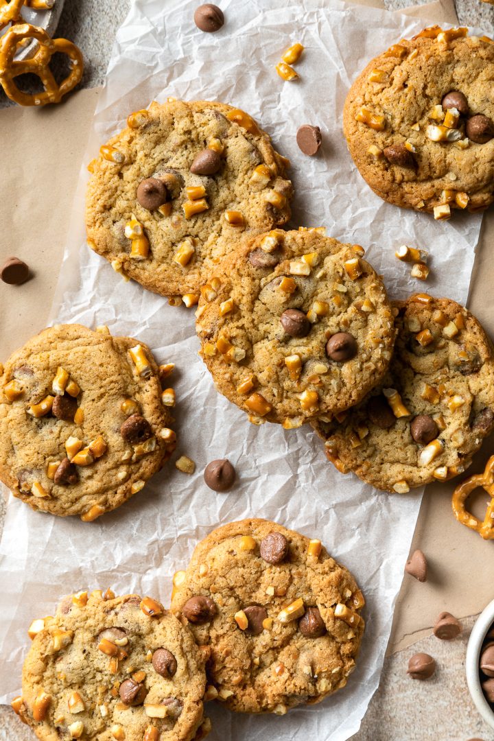 Chocolate chips cookies with pretzels scattered with chocolate chips.
