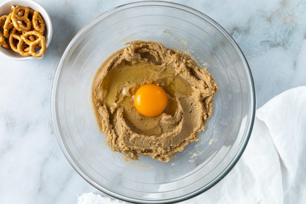 An egg added to the butter and sugar.