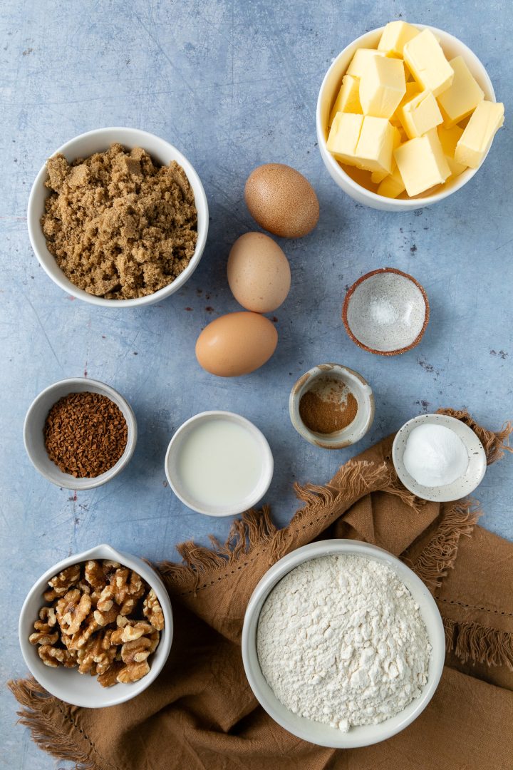 Ingredients needed to make the cake weighed out and placed in separate bowls.